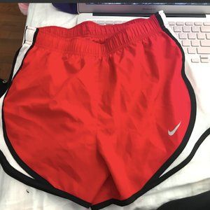 red nike shorts